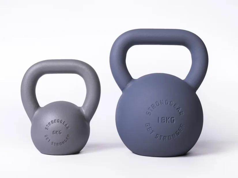 A set of grey and silver steel kettlebells StrongGear